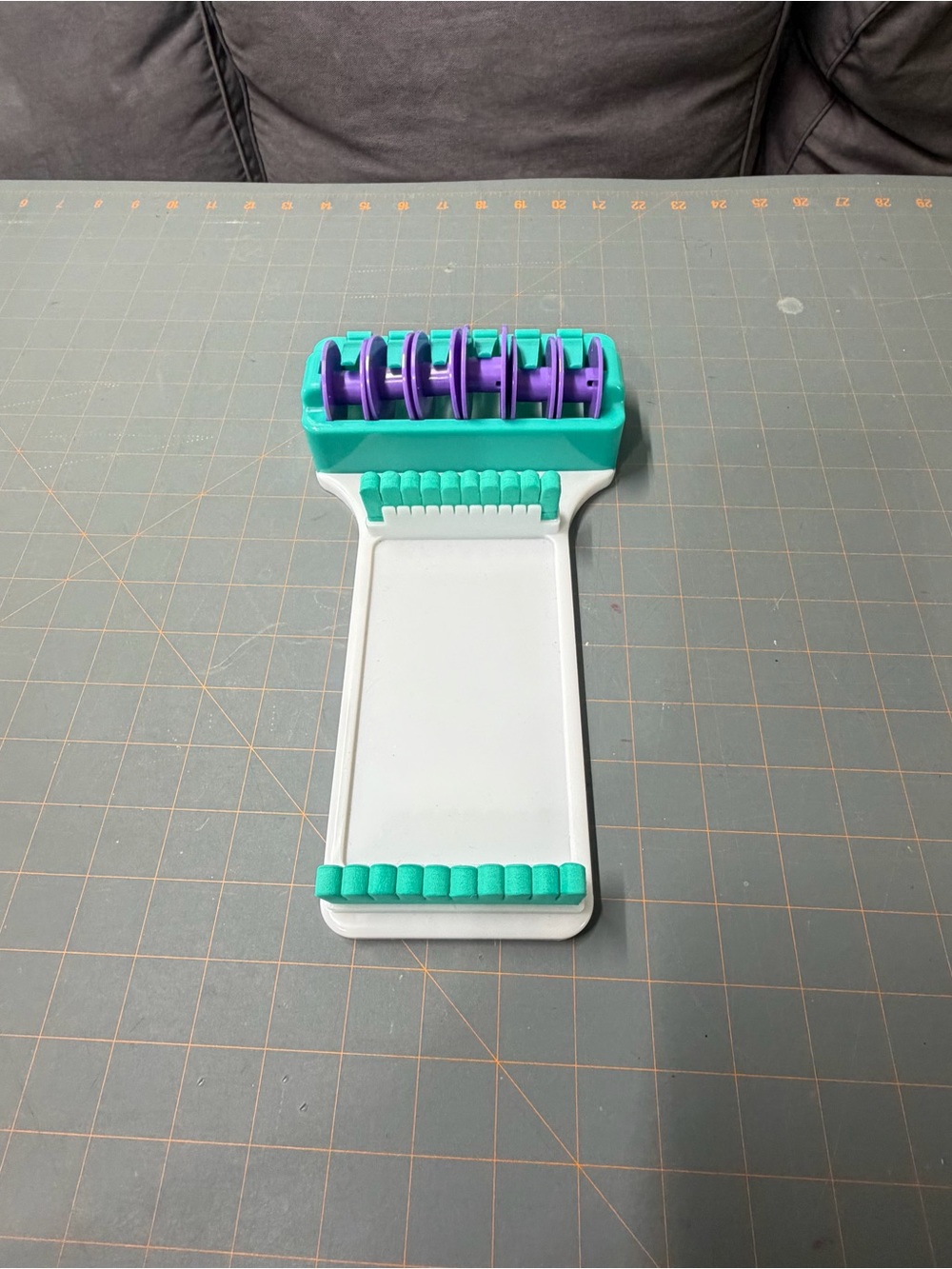 Craft Tool with Teal and Purple Accents